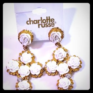 Gold cross earrings with white rose decor